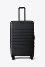 The Hybrid Check-In Roller in Black