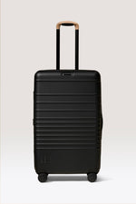 The Medium Check-In Roller in Black