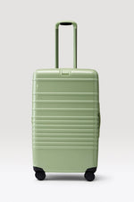 The Medium Check-In Roller in Glossy Mint