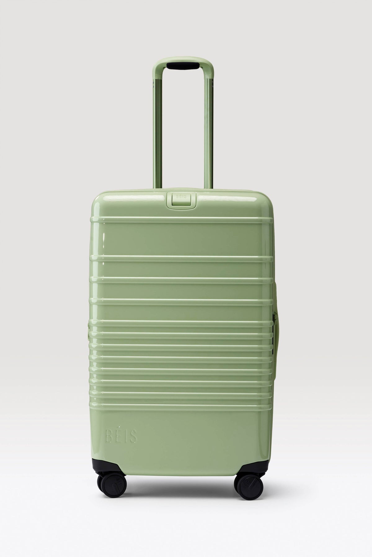 The Medium Check-In Roller in Glossy Mint