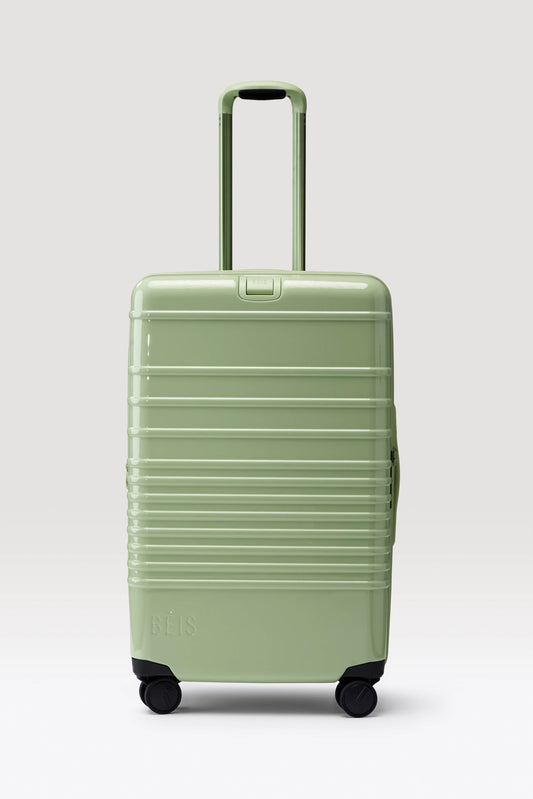 The Medium Check-In Roller in Glossy Mint