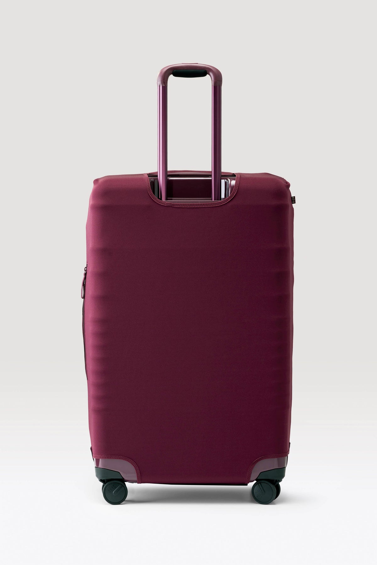 The Large Check-In Luggage Cover in Plum